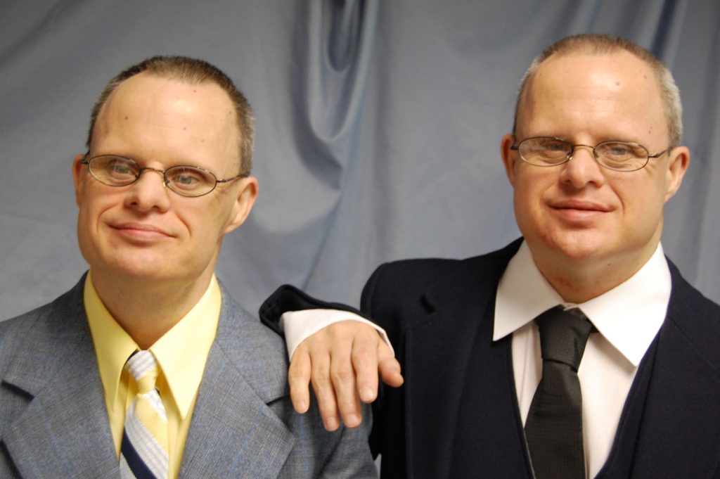 photo of two adult brothers with down syndrome